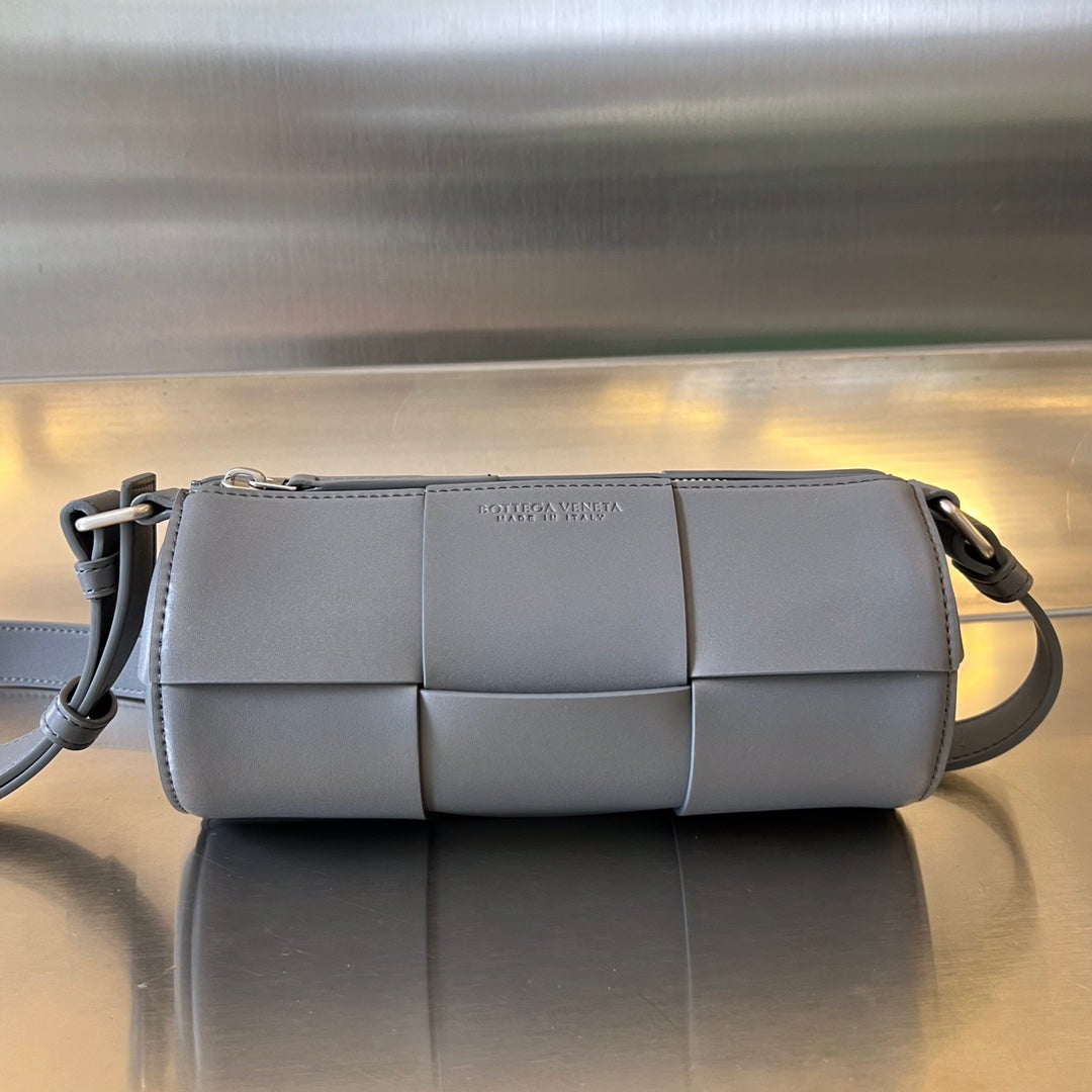 BOTTEGA VENETA SMALL CYLINDER CASSETTE 21 IN LAVA GRAY CALFSKIN