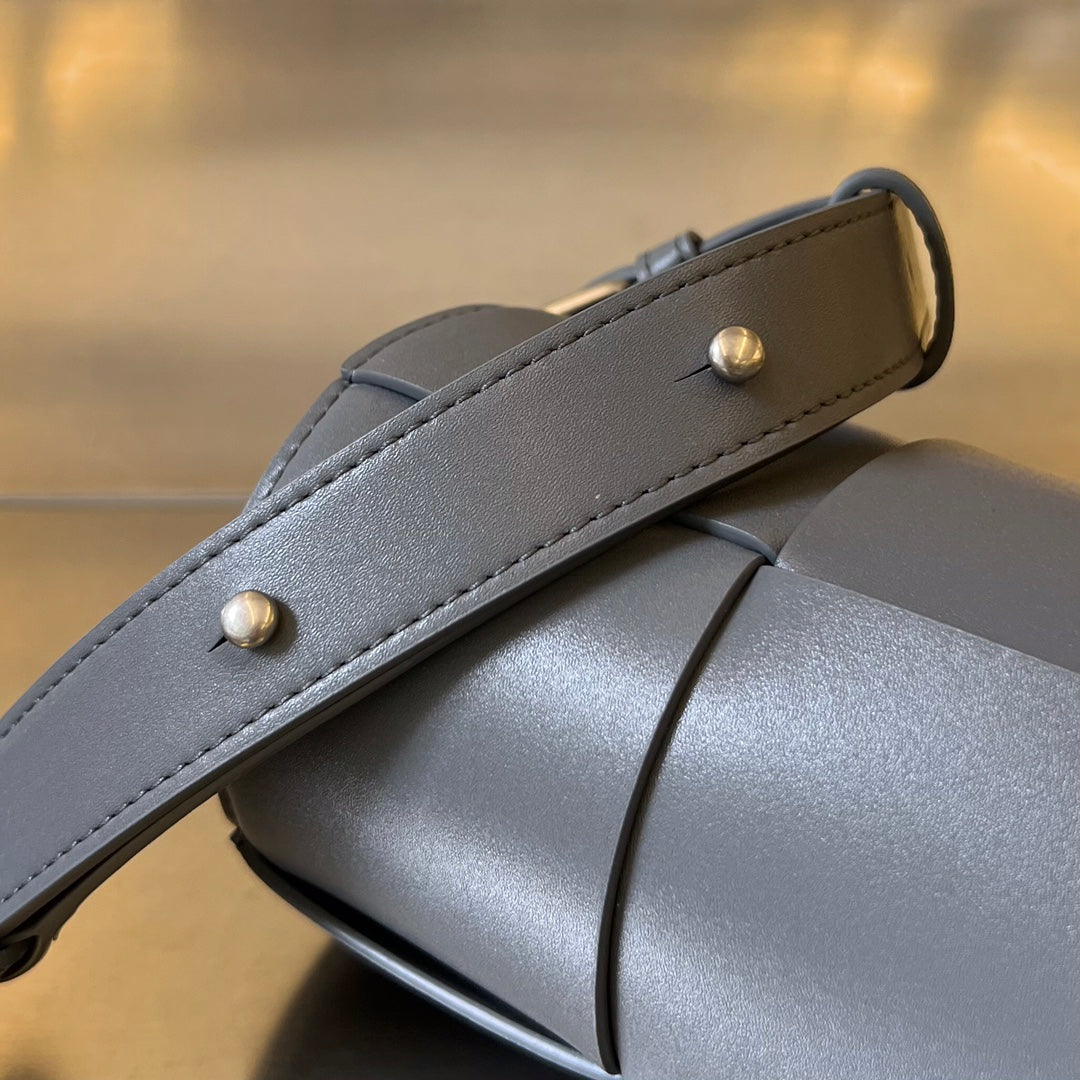 BOTTEGA VENETA SMALL CYLINDER CASSETTE 21 IN LAVA GRAY CALFSKIN