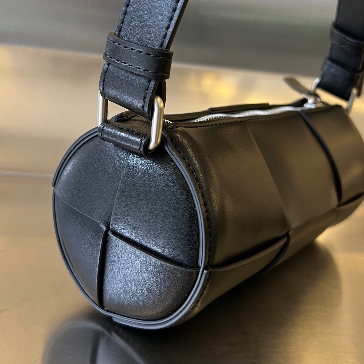 BOTTEGA VENETA SMALL CYLINDER CASSETTE 21 IN BLACK CALFSKIN