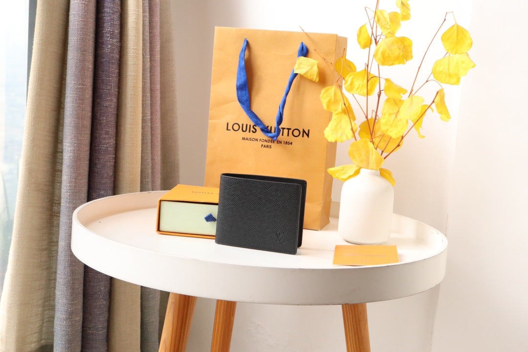 LOUIS VUITTON LV 25S SLENDER WALLET 11 IN BLACK TAIGA CALFSKIN