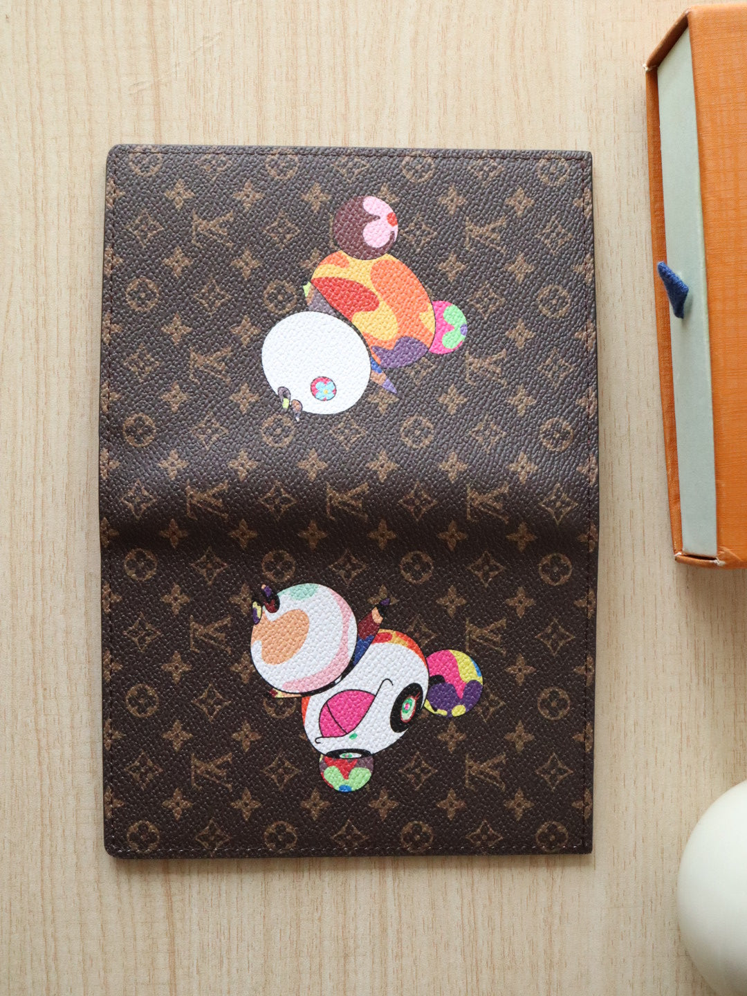 LOUIS VUITTON DOLL PASSPORT WALLET IN CHOCOLATE BROWN MONOGRAM CALFSKIN